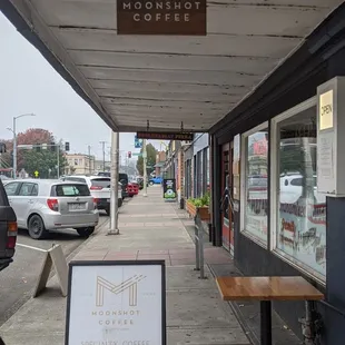 a sign on the sidewalk