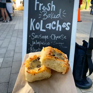 fresh baked kolaaches on a paper bag