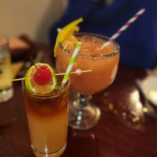 two cocktails on a table