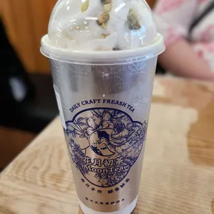 Da Hong Pao Milk Tea with Whipped Cream and Pistachio