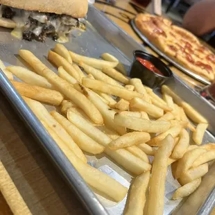 Philly cheesesteak and fries