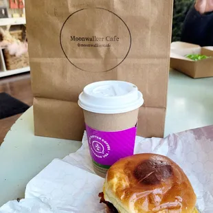 Almond joy latte and Moonwalker breakfast sandwich w/ bacon, fried egg, cheese and brioche bun with garlic aoili. Omg, delicious!!!