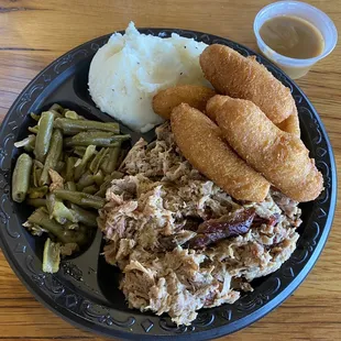 Bbq Pork with 2 fixins and hushpuppies. Delicious!