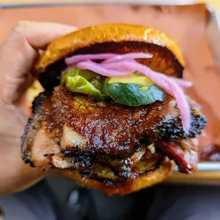 Sloppy Moo.. Brisket and sausage with pickles and onions. You need to wear a bib..