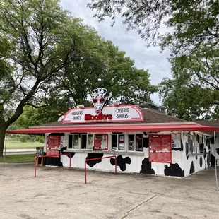 a dairy shop with a cow theme