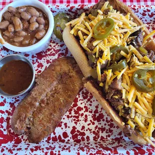 Chopped brisket sandwich lunch special with beans and added hot link