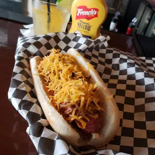 Moose Dog Monday's at Mooses Martini Pub....Chef Jeff created this bacon, dorito inner layered with triple cheese chili Moose Dog. Delicious