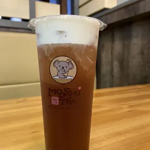 a cup of iced tea on a table