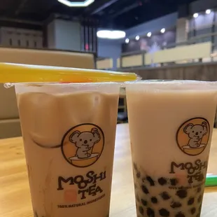 two cups of bubble tea on a table