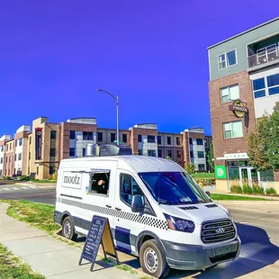 a van parked on the side of the road
