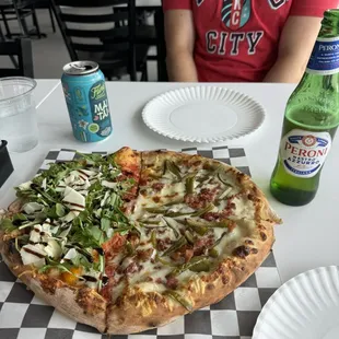 Half Oaxaca and jalapeño, half special of the day arugula with tomato and roasted garlic