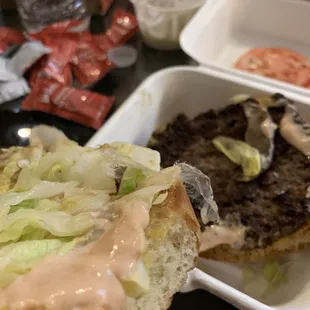 i opened the burger up to take the tomato off ..... and there's literally plastic . An actual piece of plastic ...