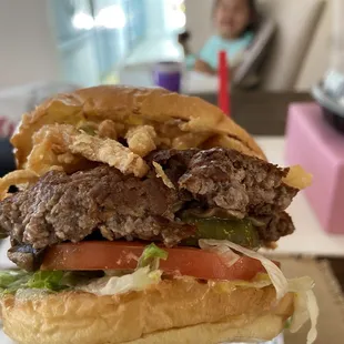 1/4lb beef, fried onions, tomato, pickles, relish, mushrooms, mooyah sauce, mustard. 10/10!