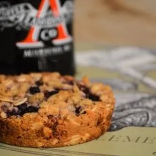 a muffin and a bottle of beer