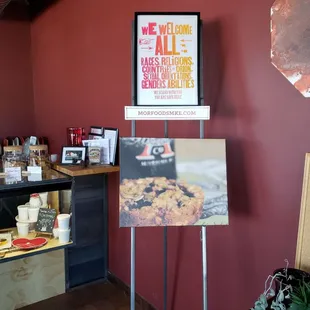 a sign in front of the counter