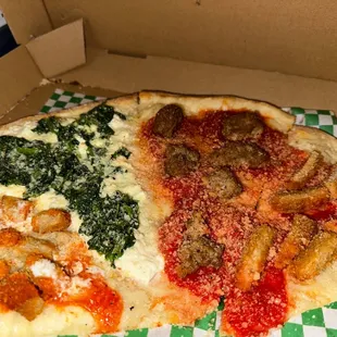 a slice of pizza in a box