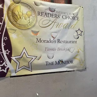 a banner hanging on a wall