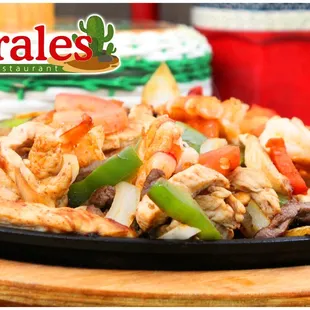 a plate of chicken and vegetables