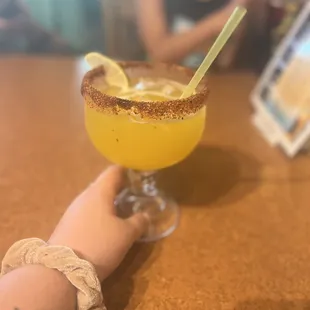 Mango margarita with tajin and oso mix