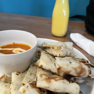 Naan bread bites and chicken tiki masala dipping sauce