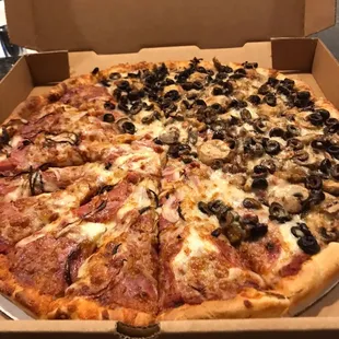 Large half olive and mushroom and half salami and onion pizza