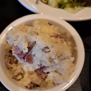 Garlic mashed potatoes with no butter or milk just a potato with garlic. Gross