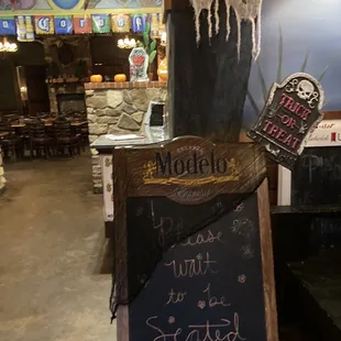 a chalk board with a sign