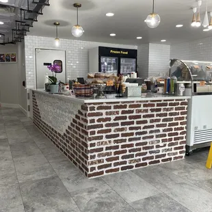 a brick counter in a restaurant