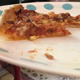 Close up of a three topping Morelli's pizza from earlier today. The Corelle plate is almost as thick!