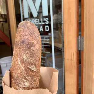 Sourdough tordu (like a baguette but the dough gets twisted) are delicious. It's partially whole wheat.