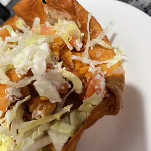 Taco salad. Dark shell.