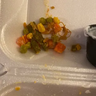 a plastic container with food in it