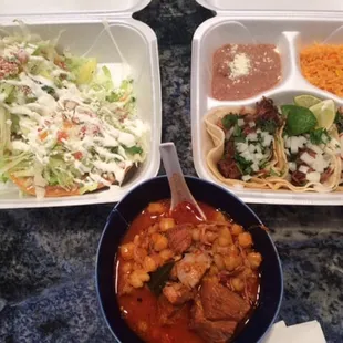 Pazole to go. Comes with Tostadas. 3 taco platter. Carnitas. Spectacular.