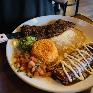 Carne Asada plate - enough for 2 people! Grilled perfection of a steak with cheese enchilada AND rice AND beans too. Best plate!