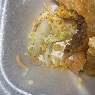 Hair in my 22. Crispy Beef Taco Combo Plate