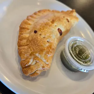 Baked ham and cheese empanada