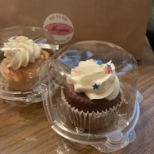 Red velvet with cream cheese icing and Vanilla cupcakes.