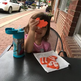 Early morning Tiger cookie before school with my beautiful granddaughter