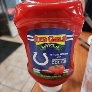 a ketchup bottle on a table