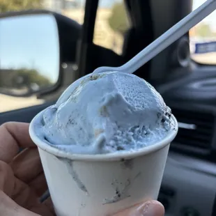One scoop of Cookie Monster in a cup