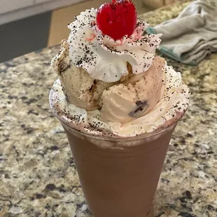 Espresso Milkshake topped with cappuccino crunch ice cream and espresso grinds