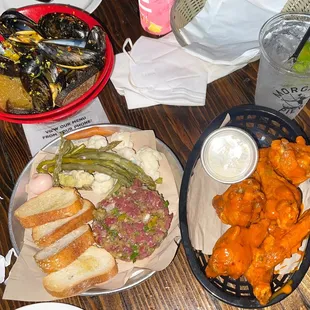 Steamed Mussels, Steak Tartare and Crispy Chicken Wings