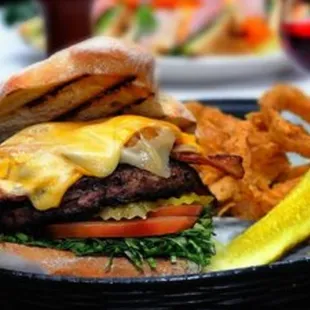 a cheeseburger and onion rings