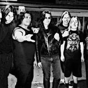 a black and white photo of a group of people