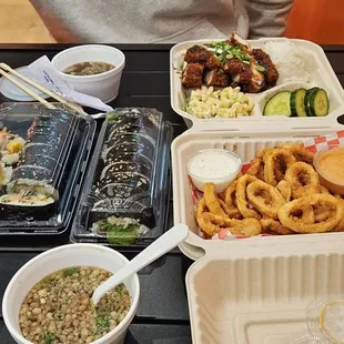 Chicken katsu, shrimp tempura kimbap, veggie kimbap, calamari fries, and miso soup.