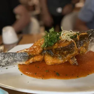 Whole branzino fish. Deboned. No true. I had a mouthful of bones so always chew carefully