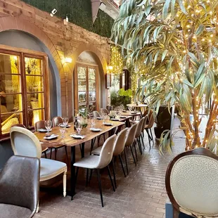 a dining room with tables and chairs