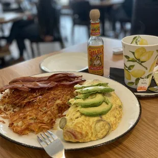 Chicken Carnitas Omelette with hash browns and bacon!