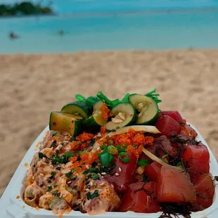 Delicious! 2 choice Spicy Ahi and Shoyu Limu with seaweed salad and kimchee cucumbers