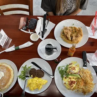 a table full of breakfast foods